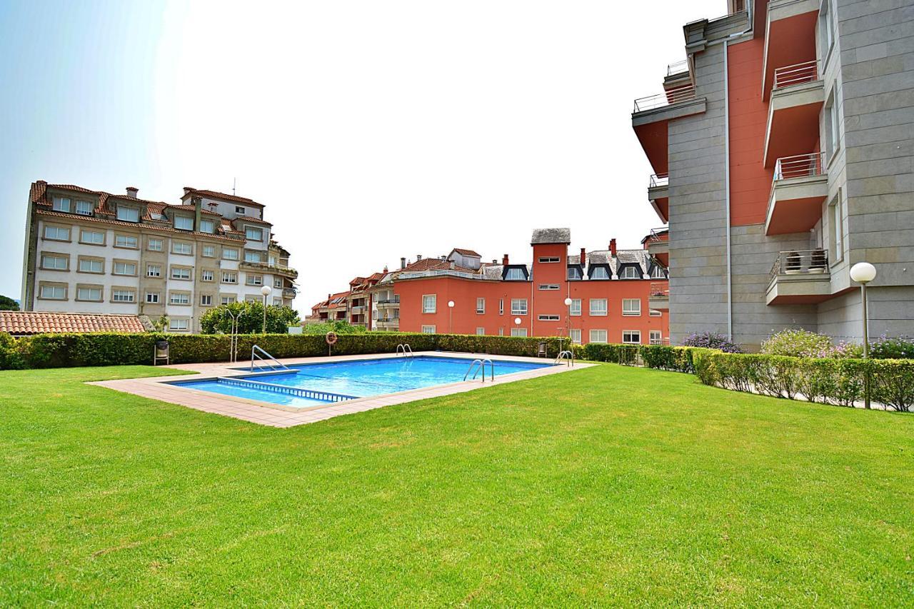 Galihost - Apartamento Con Piscina En El Centro De Sanxenxo Kültér fotó